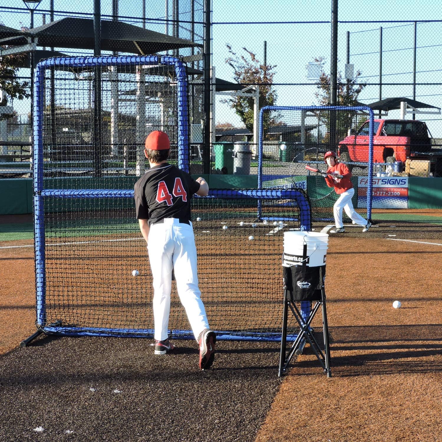JUGS Protector Blue Series L-Shaped Pitchers Screen — Baseball Pitcher and Pitching Machine Protection, 7'H x 7'W with a 3' x 3' cutout, 60 Ply Poly-E Netting and 1.5' Diameter Frame, 1-Year Guarantee